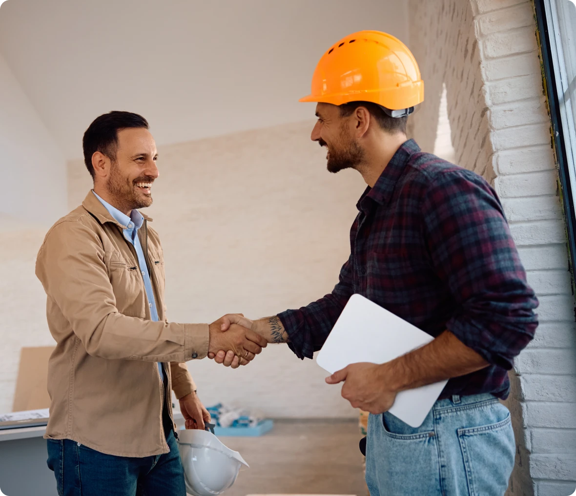 Builders in a handshake